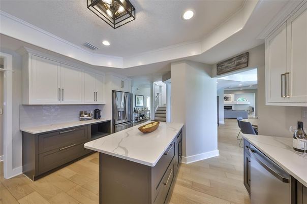 Dining room, Interior, Kitchen, Recessed Lighting, Stainless Steel Appliances, Wood Texture Flooring