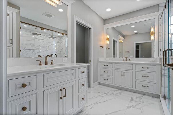 Bathroom, Dual Sink Vanities, Glass Shower, Interior, Marble, Marble Walls, Recessed Lighting