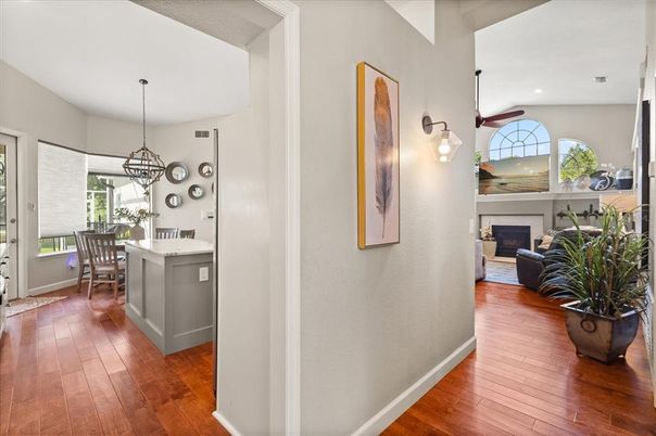 Dining room, Fireplace, Interior, Living room, Pendant Lights, Recessed Lighting, Wood Texture Flooring