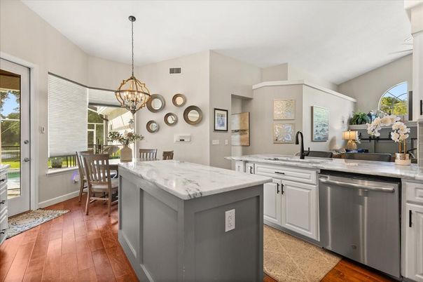 Dining room, Interior, Kitchen, Pendant Lights, Stainless Steel Appliances, Wood Texture Flooring