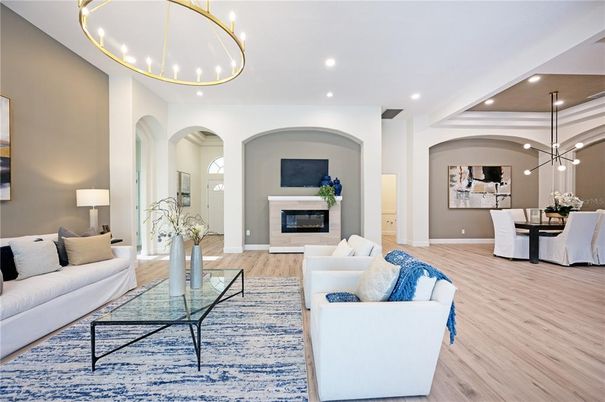 Dining room, Fireplace, Interior, Living room, Pendant Lights, Recessed Lighting, Wood Texture Flooring