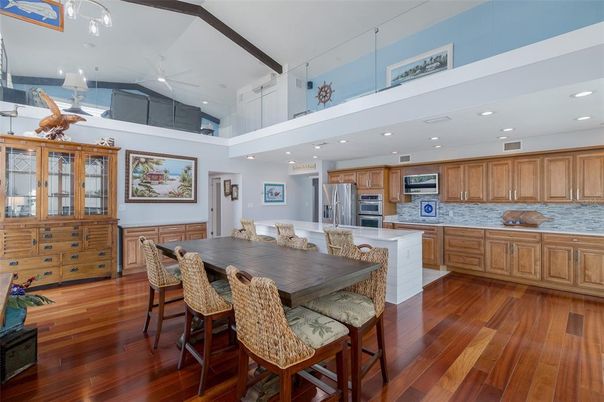 Dining room, Interior, Kitchen, Recessed Lighting, Stainless Steel Appliances, Wood Texture Flooring