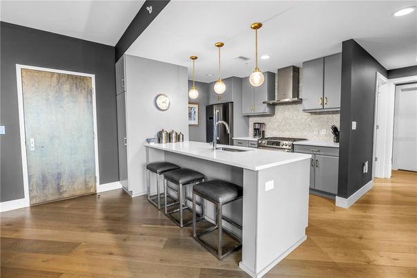 Interior, Kitchen, Pendant Lights, Recessed Lighting, Stainless Steel Appliances, Wood Texture Flooring
