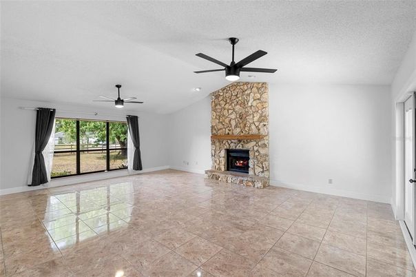 Empty room, Fireplace, Interior, Recessed Lighting, Stone Walls