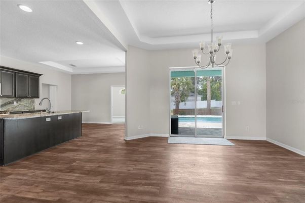 Chandelier, Empty room, Interior, Kitchen, Recessed Lighting, Wood Texture Flooring