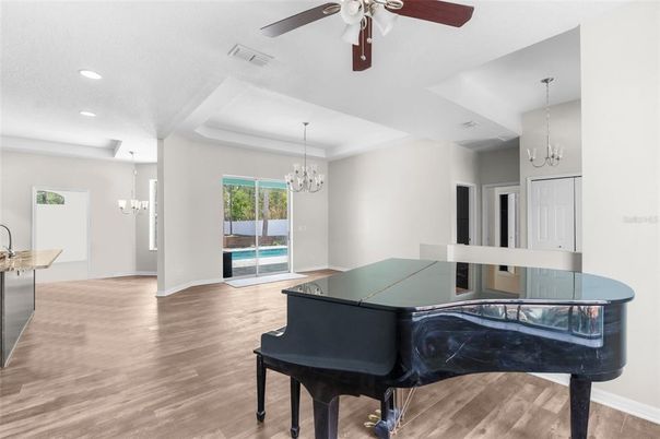 Chandelier, Interior, Pendant Lights, Piano, Recessed Lighting, Wood Texture Flooring