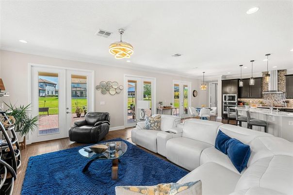 Dining room, Interior, Kitchen, Living room, Pendant Lights, Recessed Lighting, Stainless Steel Appliances, Wood Texture Flooring