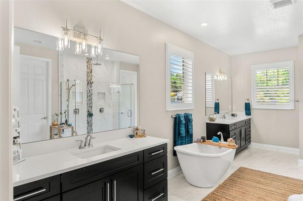 Bathroom, Dual Sink Vanities, Free Standing Baths, Glass Shower, Interior, Marble, Marble Walls, Recessed Lighting