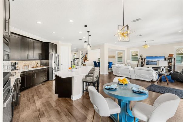 Dining room, Interior, Kitchen, Living room, Pendant Lights, Recessed Lighting, Stainless Steel Appliances, Wood Texture Flooring