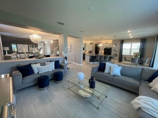 Chandelier, Dining room, Interior, Kitchen, Living room, Pendant Lights, Recessed Lighting, Stainless Steel Appliances, Wood Texture Flooring