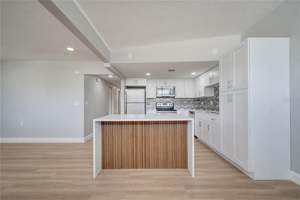 Interior, Kitchen, Recessed Lighting, Stainless Steel Appliances, Wood Texture Flooring