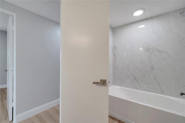 Bathroom, Interior, Marble Walls, Recessed Lighting, Wood Texture Flooring