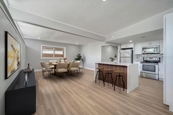 Dining room, Interior, Kitchen, Recessed Lighting, Stainless Steel Appliances, Wood Texture Flooring