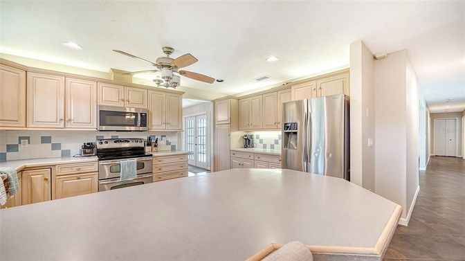 Interior, Kitchen, Recessed Lighting, Stainless Steel Appliances, Wood Texture Flooring