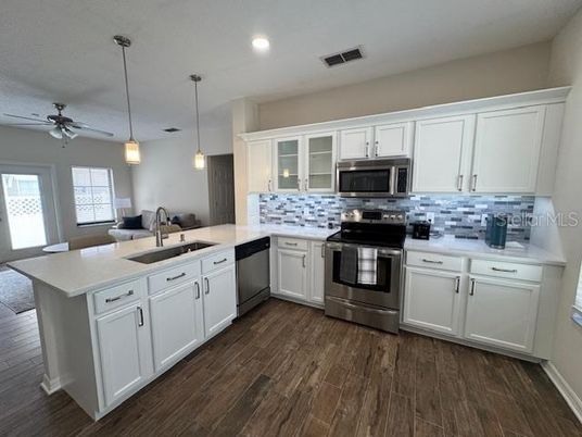 Interior, Kitchen, Pendant Lights, Recessed Lighting, Stainless Steel Appliances, Wood Texture Flooring