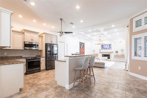Fireplace, Interior, Kitchen, Living room, Pendant Lights, Recessed Lighting, Stainless Steel Appliances
