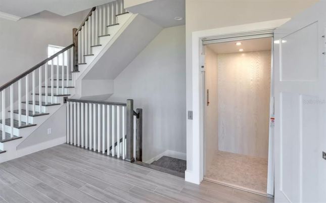 Elevator, Interior, Recessed Lighting, Wood Texture Flooring