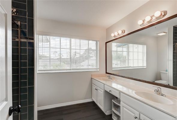 Bathroom, Dual Sink Vanities, Interior, Tile Countertops, Wood Texture Flooring