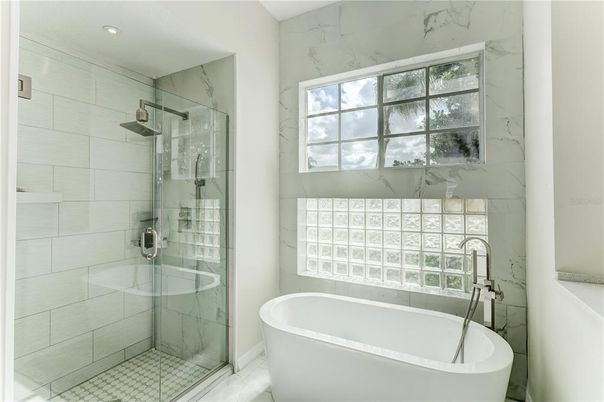 Bathroom, Free Standing Baths, Glass Shower, Interior, Marble Walls, Recessed Lighting