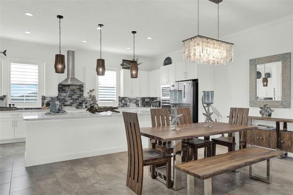 Chandelier, Dining room, Interior, Kitchen, Pendant Lights, Recessed Lighting, Stainless Steel Appliances