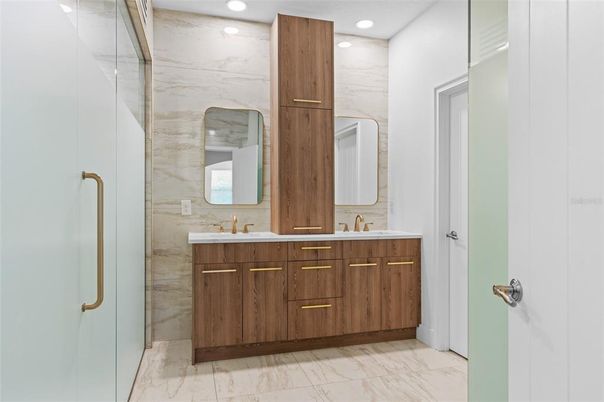 Bathroom, Dual Sink Vanities, Glass Shower, Interior, Marble, Marble Walls, Recessed Lighting
