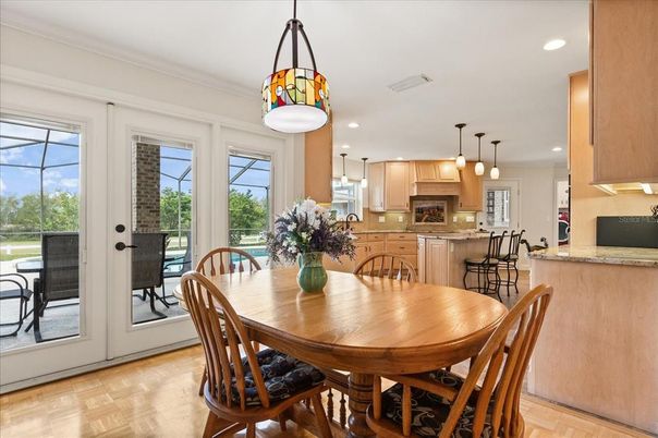 Dining room, Interior, Kitchen, Pendant Lights, Recessed Lighting, Stainless Steel Appliances, Wood Texture Flooring