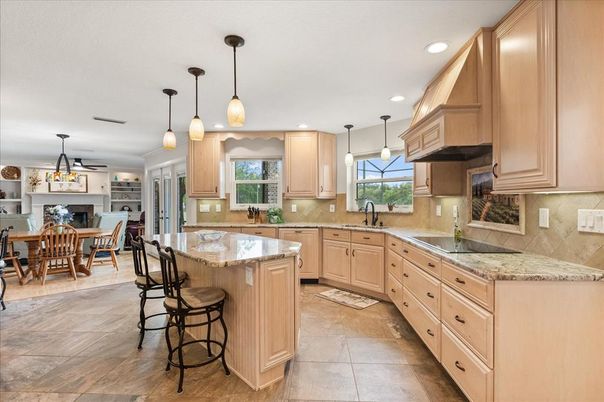 Dining room, Fireplace, Interior, Kitchen, Pendant Lights, Recessed Lighting, Stainless Steel Appliances