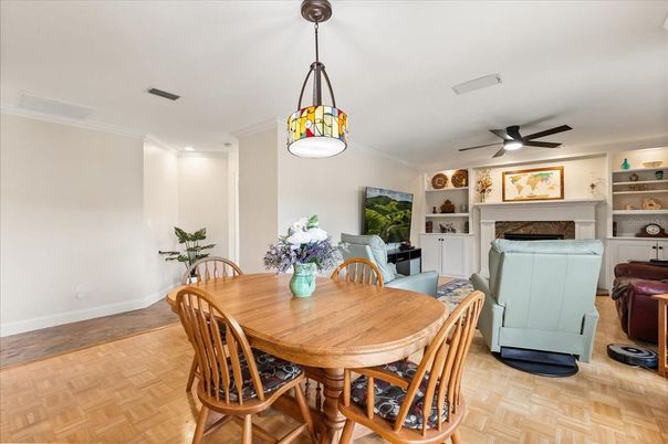 Dining room, Fireplace, Interior, Pendant Lights, Recessed Lighting, Wood Texture Flooring