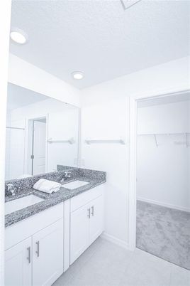 Bathroom, Dual Sink Vanities, Interior, Recessed Lighting, Walk-in Closets