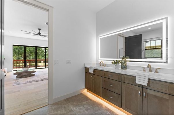 Bathroom, Dual Sink Vanities, Interior, Recessed Lighting, Wood Texture Flooring