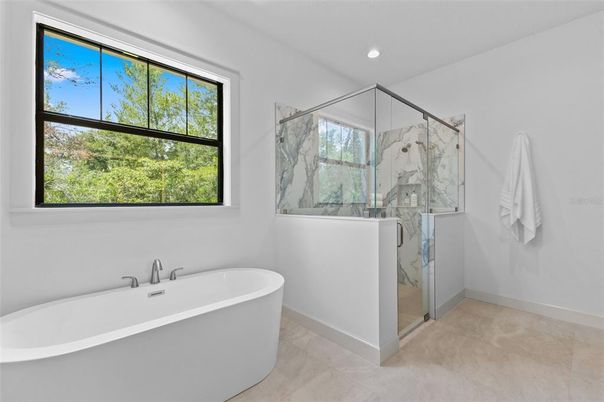 Bathroom, Free Standing Baths, Glass Shower, Interior, Marble, Marble Walls, Recessed Lighting