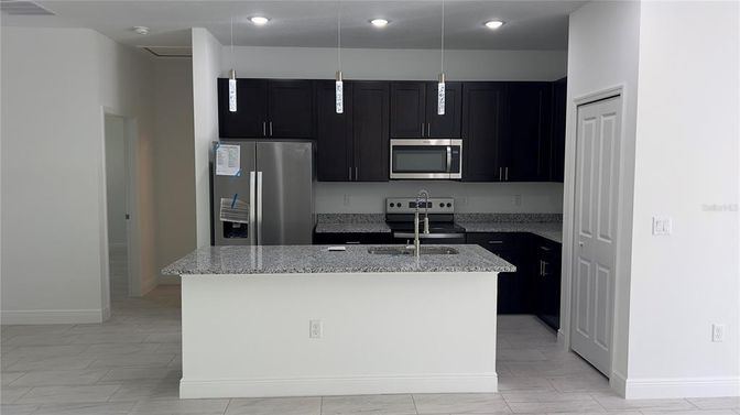 Interior, Kitchen, Marble, Pendant Lights, Recessed Lighting, Stainless Steel Appliances