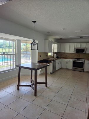 Dining room, Interior, Kitchen, Pendant Lights, Stainless Steel Appliances