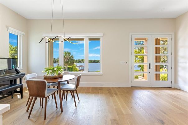 Dining room, Interior, Pendant Lights, Piano, Water, Wood Texture Flooring