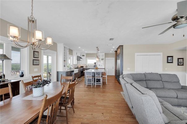 Chandelier, Dining room, Interior, Kitchen, Living room, Pendant Lights, Recessed Lighting, Wood Texture Flooring