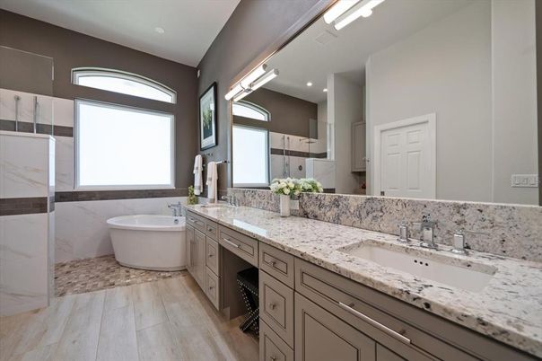 Bathroom, Dual Sink Vanities, Free Standing Baths, Interior, Recessed Lighting, Wood Texture Flooring