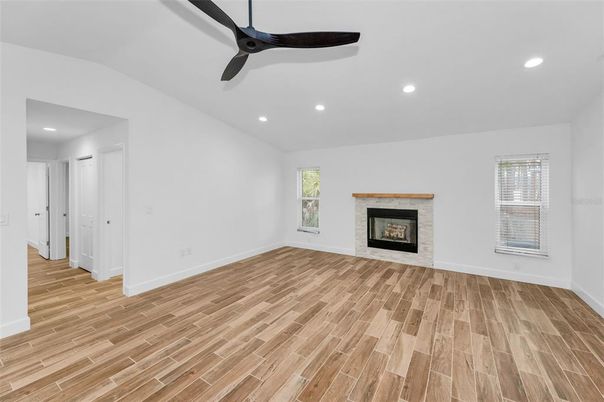 Empty room, Fireplace, Interior, Recessed Lighting, Wood Texture Flooring