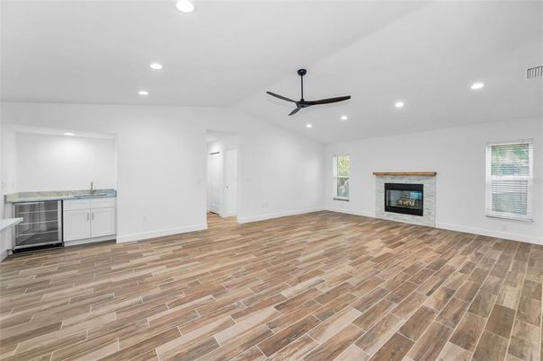 Empty room, Fireplace, Interior, Recessed Lighting, Wood Texture Flooring