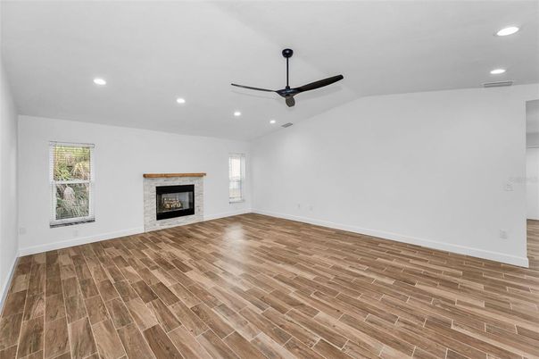 Empty room, Fireplace, Interior, Recessed Lighting, Wood Texture Flooring