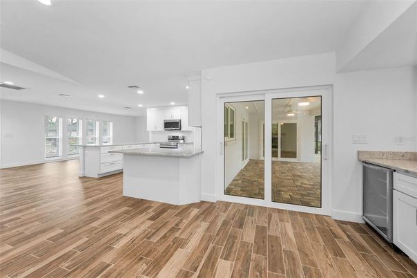 Interior, Kitchen, Recessed Lighting, Stainless Steel Appliances, Wood Texture Flooring