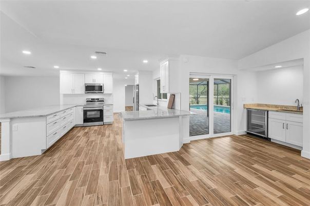 Interior, Kitchen, Recessed Lighting, Stainless Steel Appliances, Wood Texture Flooring