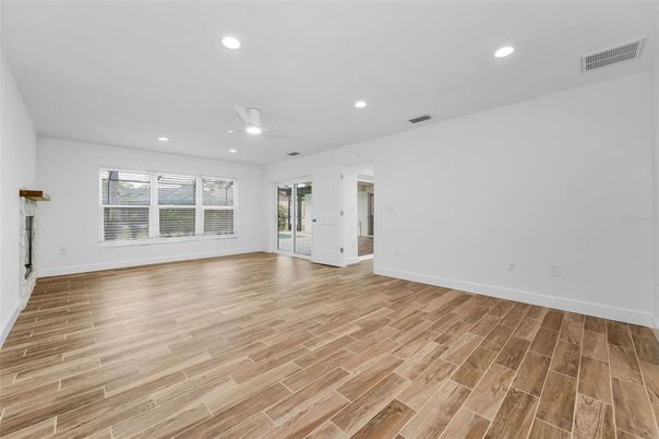 Empty room, Fireplace, Interior, Recessed Lighting, Wood Texture Flooring