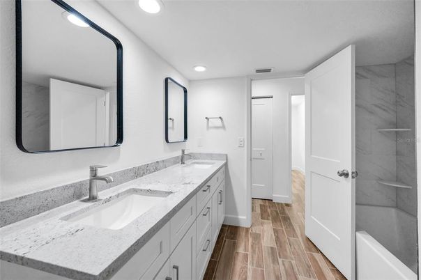 Bathroom, Dual Sink Vanities, Interior, Recessed Lighting, Wood Texture Flooring