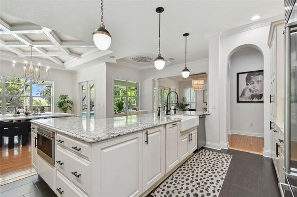 Chandelier, Interior, Kitchen, Pendant Lights, Recessed Lighting, Stainless Steel Appliances, Wood Texture Flooring