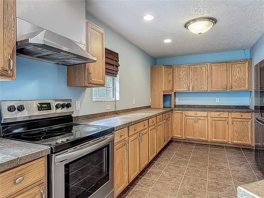 Interior, Kitchen, Recessed Lighting, Tile Countertops