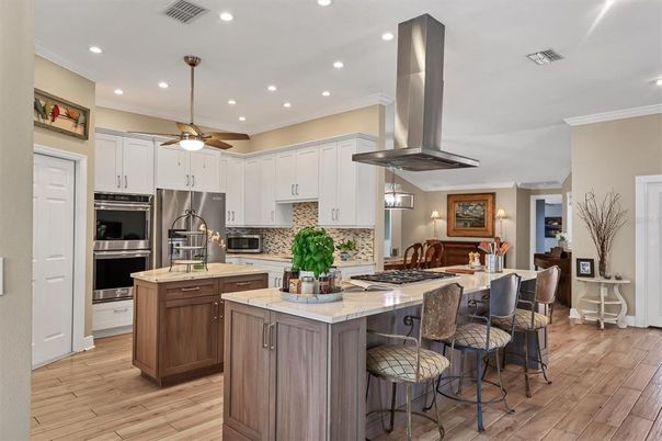 Interior, Kitchen, Pendant Lights, Recessed Lighting, Stainless Steel Appliances, Wood Texture Flooring