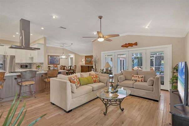 Dining room, Interior, Kitchen, Living room, Pendant Lights, Recessed Lighting, Stainless Steel Appliances, Wood Texture Flooring