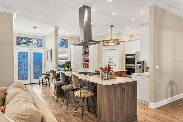 Dining room, Interior, Kitchen, Pendant Lights, Recessed Lighting, Stainless Steel Appliances, Wood Texture Flooring