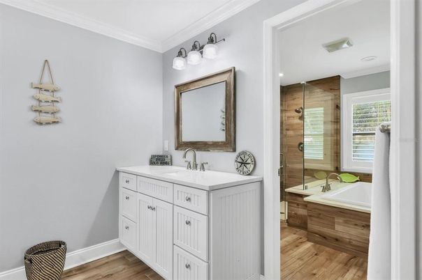 Bathroom, Dual Sink Vanities, Glass Shower, Interior, Recessed Lighting, Wood Texture Flooring