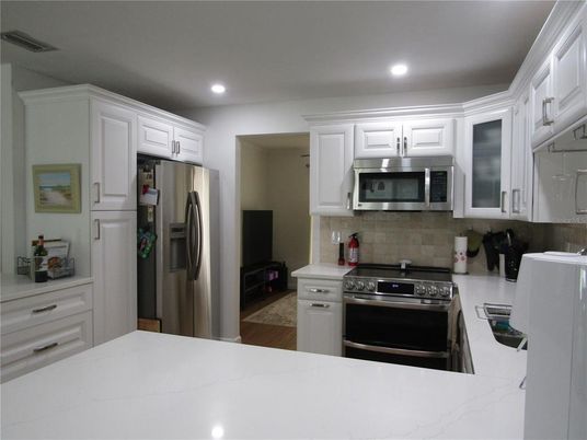 Interior, Kitchen, Recessed Lighting, Stainless Steel Appliances, Wood Texture Flooring